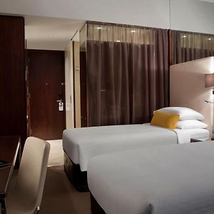 Habitación con 2 Camas Individuales en Pisos Superiores